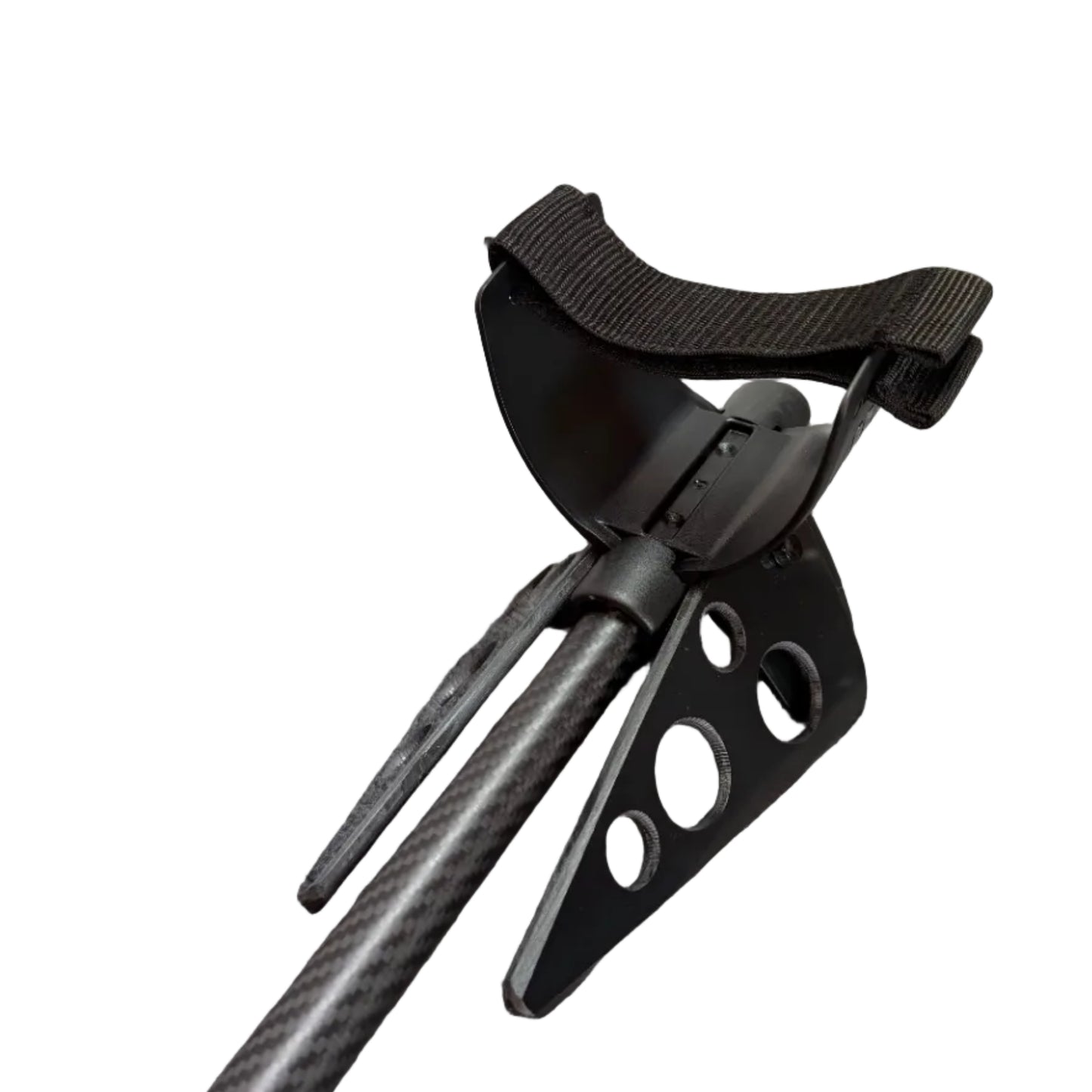 Black tripod on a textured gray surface
